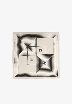 Manta de algodón beige con patrón geométrico en espiral negro. Presenta cuadrados centrados con diferentes grosores de línea y dos acentos de logo.