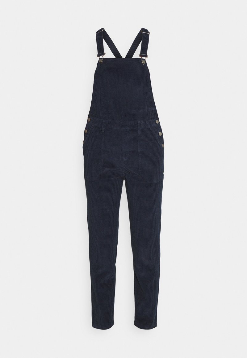 Salopette en velours côtelé bleu marine avec bretelles réglables, bavette avant, fermetures latérales à boutons et pantalon long coupe slim.