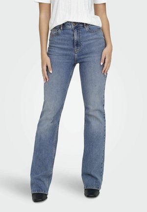 Lichtblauwe flared jeans van denim. Heeft een hoge taille, een vijf-pocket ontwerp en licht vervaagde plekken met donkere stiksels.