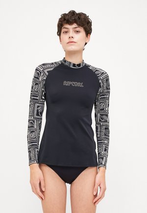 Black long-sleeve rash guard with patterned sleeves featuring leaves and geometric designs. Material is smooth and stretchy. Logo on front.