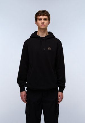 Black hooded sweatshirt featuring a front pocket, drawstring, and small logo patch. Material appears soft with a relaxed fit.