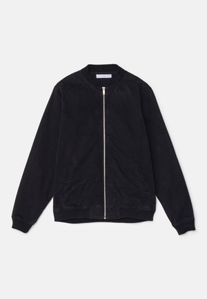 Black bomber jacket made of soft fabric with a zip closure, ribbed cuffs and collar, and two front pockets.