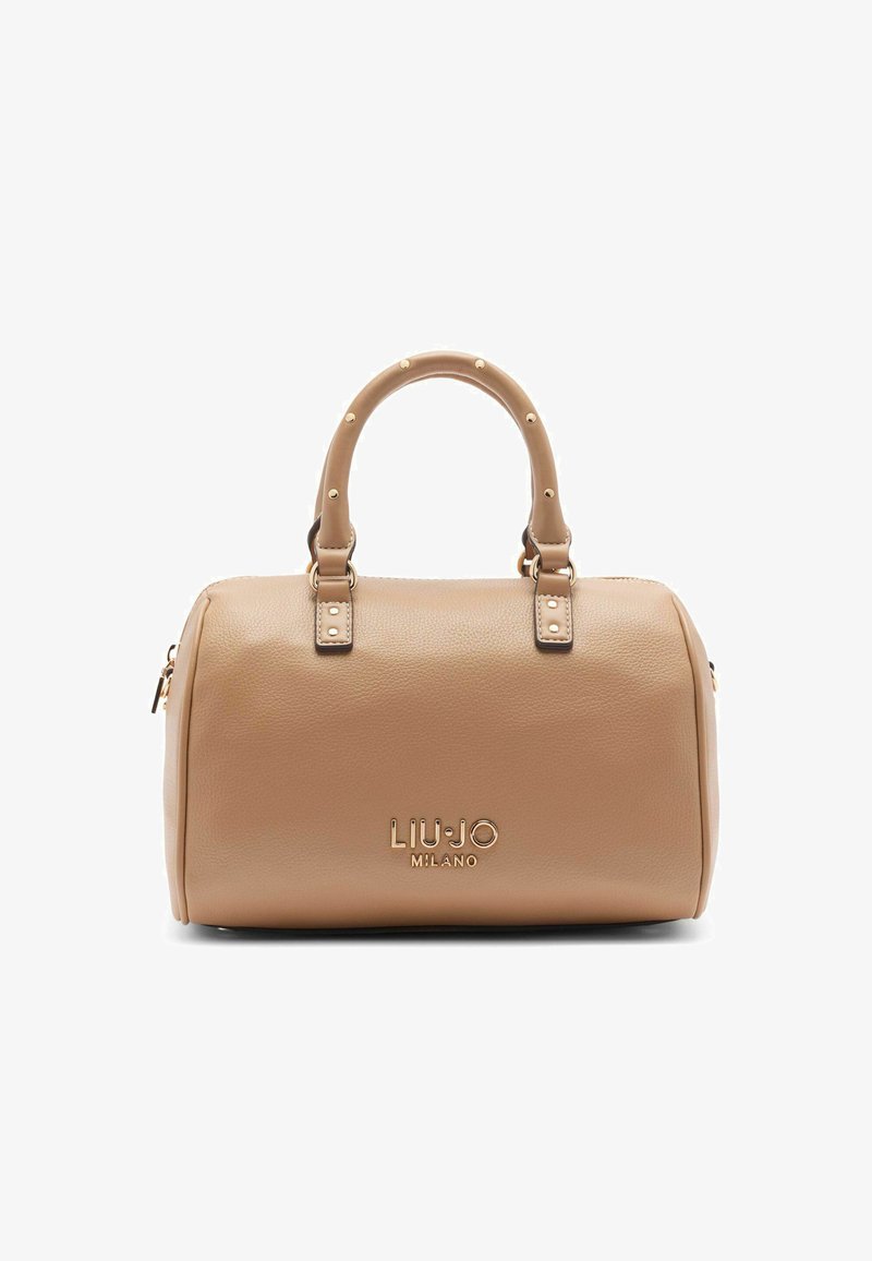 Béžová kožená kabelka s kulatým tvarem, dvojitými horními uchy a logem ve zlatém tónu. Disponuje zlatými hroty na uchu a zipovým uzávěrem.