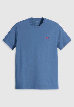 Zils kokvilnas T-krekls ar īsām piedurknēm un apaļu izgriezumu. Uz krūtīm ir neliels sarkans Levi's logotipa uzlīme. Vienkāršs dizains.