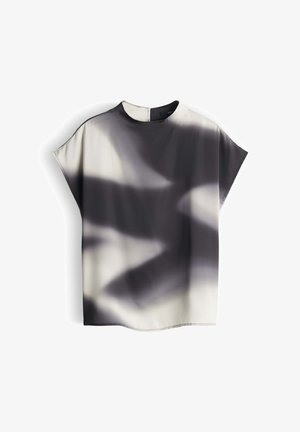 Top à manches courtes en tissu léger avec un motif dégradé de nuances de noir et de gris. Encolure ronde avec une fermeture au dos.