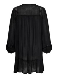 Black long-sleeve sheer blouse with lace trim on shoulders and cuffs, gathered back, and ruffled hem.
