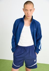 adidas Originals ARCHIVE - Teplákové kalhoty - dark blue/white