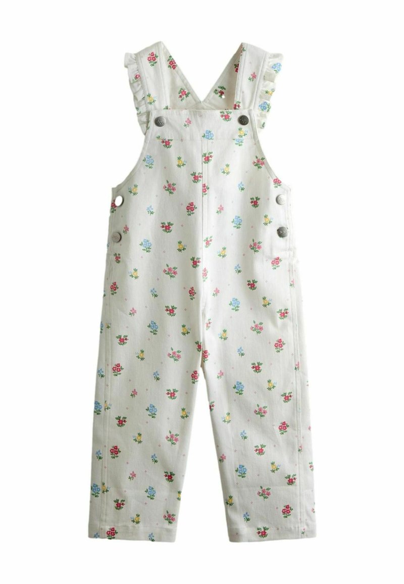 Białe bawełniane ogrodniczki z kolorowymi kwiatowymi wzorami, falbaniastymi ramiączkami, zatrzaskami i prostymi nogawkami.