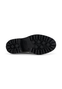 Black rubber shoe sole featuring a thick, textured tread with star-shaped patterns for grip. Smooth edges with minimal branding visible.