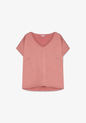 Rosa Kurzarm-V-Ausschnitt-Oberteil aus glattem Stoff, ausgestattet mit zwei seitlichen Taschen und einem leicht geschwungenen Saum für eine entspannte Passform.