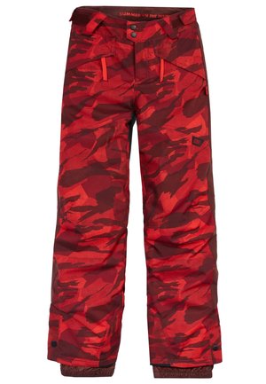 Czerwone i ciemnoczerwone ocieplane spodnie narciarskie w kamuflażowy wzór, z przednimi kieszeniami na zamek, regulowanym pasem i wzmocnionymi ściągaczami przy kostkach.