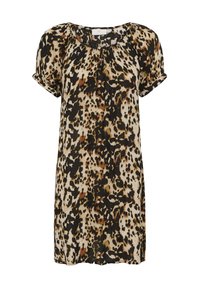 Blouse à imprimé animal avec une base crème et des taches noires et brunes. Manches courtes et col rond avec des détails froncés.