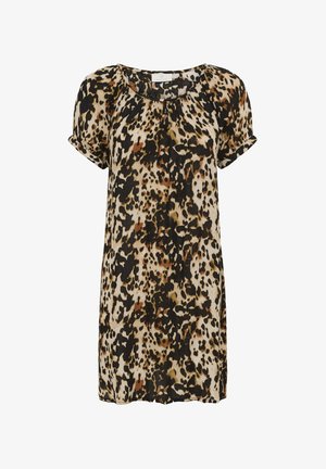 Animal print blouse featuring a cream base with black and brown spots. Short sleeves and a round neckline with gathered detailing.