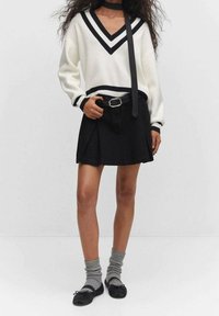 Mango Falda acampanada - black denim