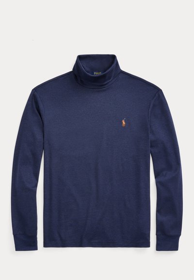 Dlhý rukáv s rolákom v námorníckej modrej farbe s malým vyšívaným oranžovým logom Polo na ľavej strane hrude.