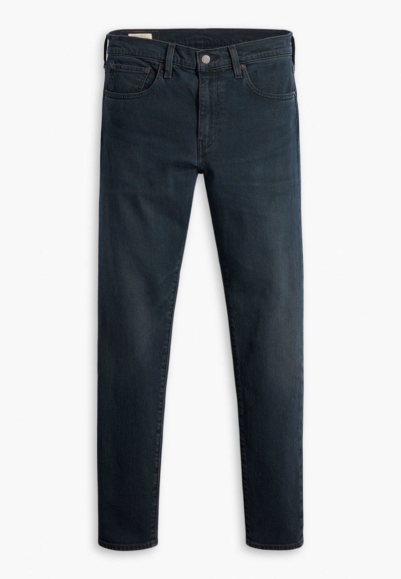 Jean en denim bleu foncé avec une coupe slim, présentant un design classique à cinq poches, des passants de ceinture et une fermeture à bouton à l'avant.