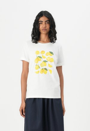 White cotton t-shirt with short sleeves featuring a colorful lemon print and green leaves at the center. Plain design, relaxed fit.
