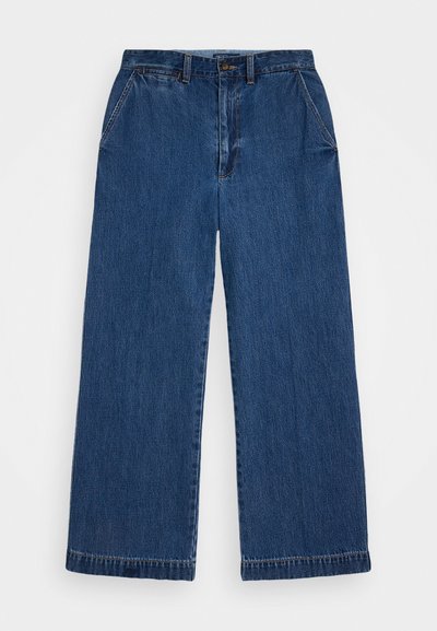 Φαρδιά μπλε τζιν από denim, με ίσια γραμμή, κλασικό σχέδιο πέντε τσέπες και αντίθετη ραφή κατά μήκος των ραφών.