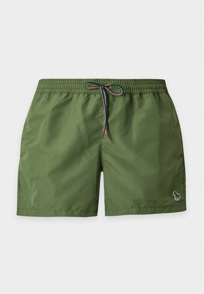 Short de bain vert avec taille élastique et cordon multicolore, avec un petit logo zèbre brodé sur la jambe gauche.