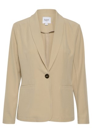 Beige blazer with a shawl collar, single black button closure, two front pockets, and long sleeves. Smooth fabric with minimal texture.