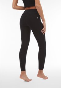 Freddy Leggings - jeans nero-cuciture in tono