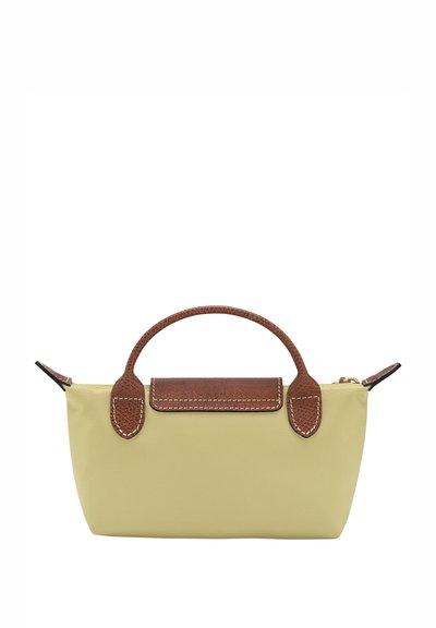 Yellow fabric bag with a textured brown leather handle and accents. Features a zip top closure and subtle stitching detail. Compact size.