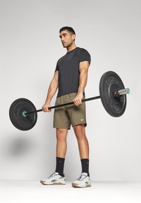 Reebok ATHLETE 2.0 CHILL - Sports T-shirts - black