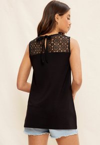 Friends Like These SLEEVELESS - REGULAR FIT - Top - black