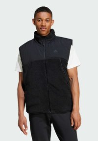 adidas Sportswear CITY ESCAPE REVERSIBLE Chaleco black