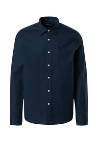 Camisa de botones azul marino con mangas largas, fabricada en un tejido suave, botones blancos y un pequeño logo en el pecho. Cuello clásico y corte ajustado.