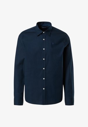 Marineblaue, langärmlige Button-up-Bluse aus weichem Stoff, mit weißen Knöpfen und einem kleinen Logo auf der Brust. Klassischer Kragen und taillierte Passform.