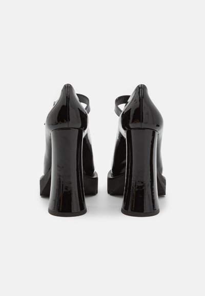 MOSCHINO Čevlji s platformo in peto - nero
