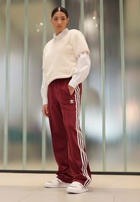 adidas Originals ADICOLOR CLASSICS FIREBIRD PRIME - Tracksuit bottoms - shadow red