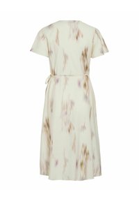 Robe midi crème à manches courtes, imprimé floral abstrait subtil et fine ceinture à nouer à la taille, vue de dos.