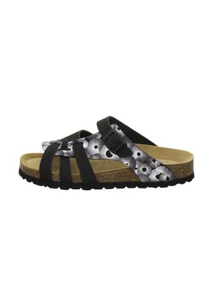 Black and white floral patterned strappy sandal with cork footbed, adjustable buckle, and textured black sole.