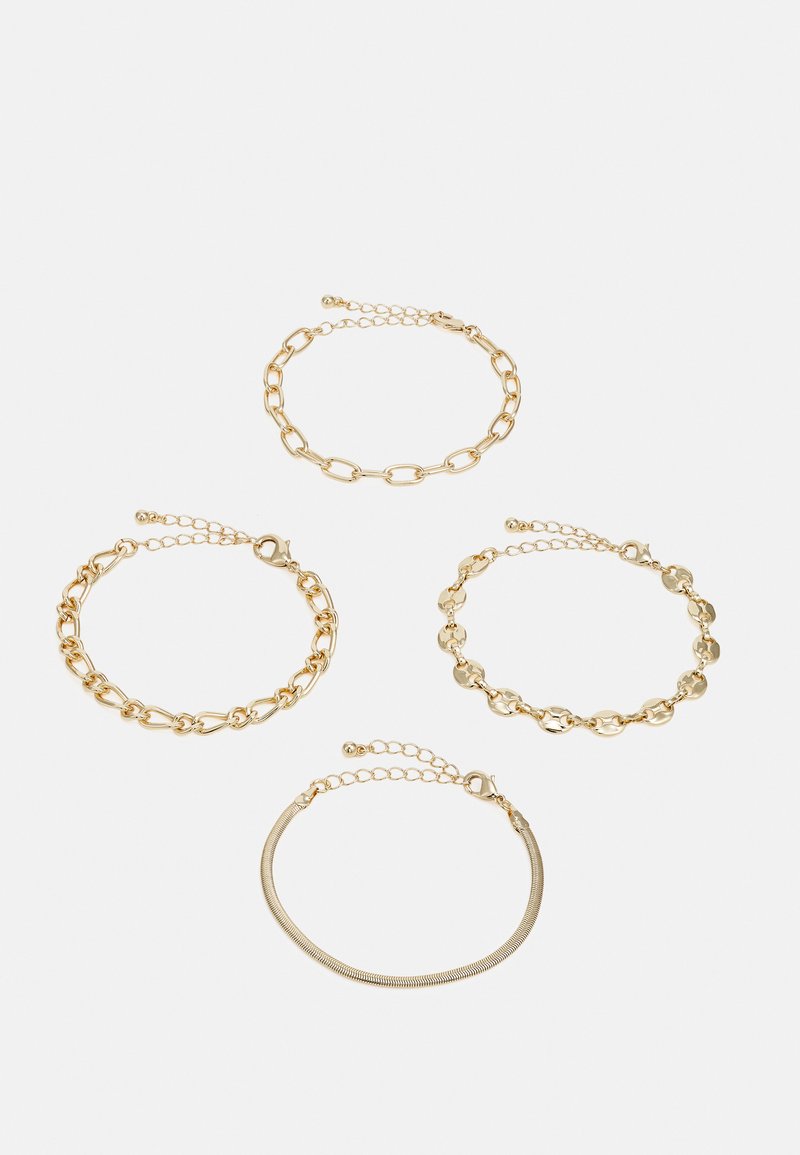 Set of four gold bracelets featuring various designs: chain links, smooth circular accents, and a sleek textured band, each with lobster clasps.