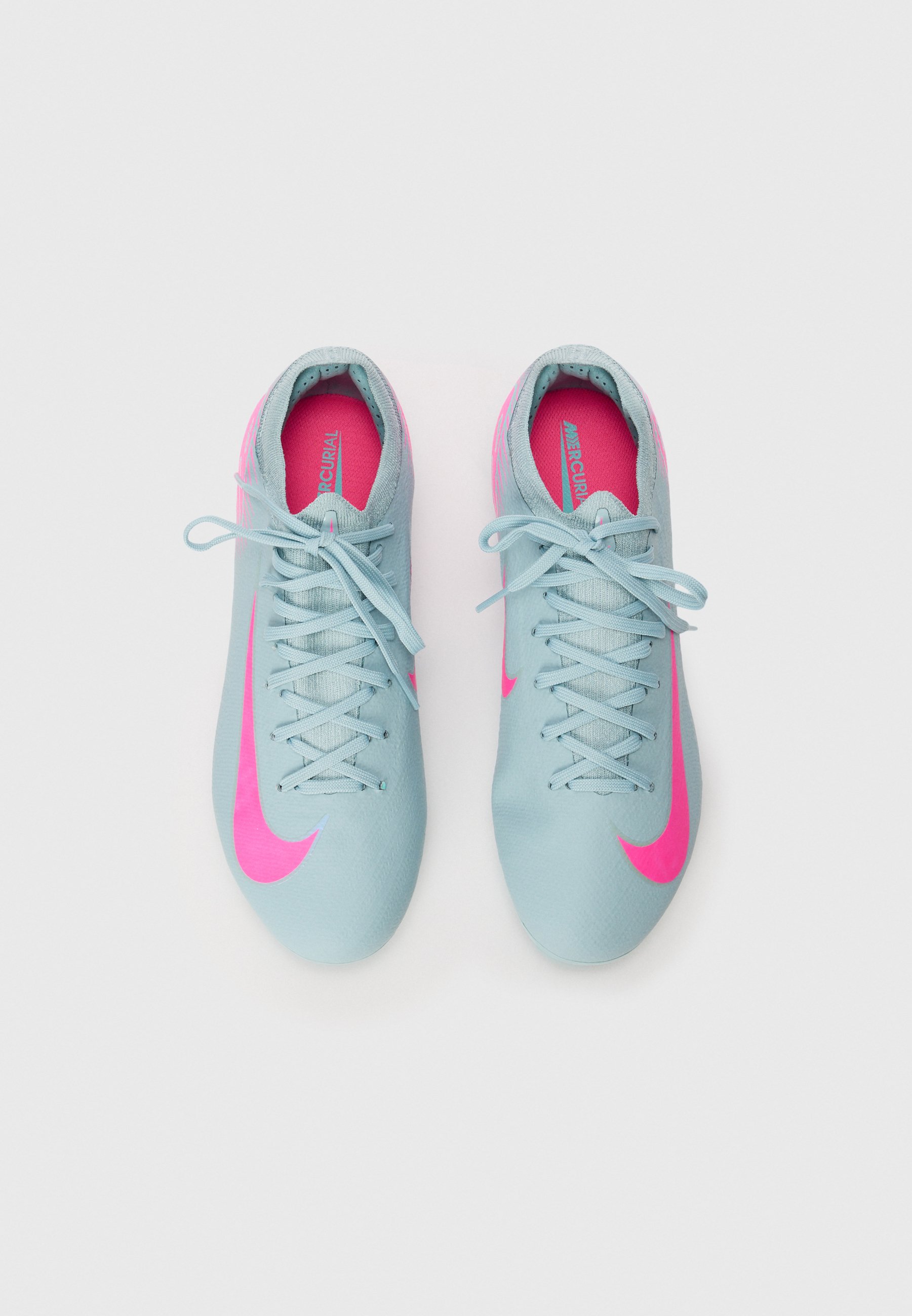 grey and pink nike boots