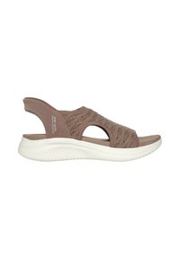 Sandalias marrones sin hebillas con correas de tela texturizada, tacón abierto y suela de goma blanca. Presentan recortes para mejorar la transpirabilidad y la comodidad.