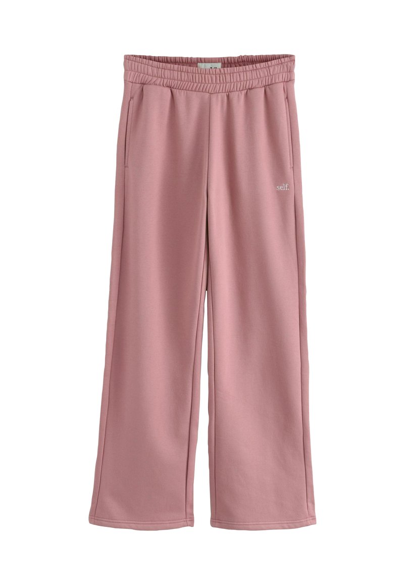 Lyserøde sweatpants med bred ben-design, elastisk talje og sidelommer. Har minimalistisk branding, lavet af blødt, strækbart stof.