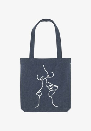 Borsa a tracolla blu scuro con un disegno a linea continua bianca di due volti che si baciano sul davanti, dotata di manici lunghi per il trasporto a spalla.