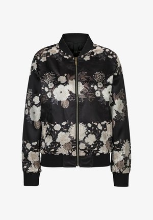 Blouson aviateur noir avec motif floral blanc et beige, fermeture éclair à l'avant, col, poignets et ourlet côtelés.