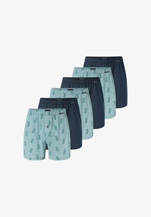 Set di boxer composto da due paia azzurri con motivi ananas e tre paia blu scuro tinta unita. Cinture elastiche visibili.