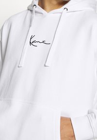 Karl Kani Jersey con capucha - white