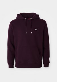 Felpa con cappuccio viola scuro, dotata di tasca frontale a marsupio, stringhe e piccolo logo bianco "Lee" sul petto.