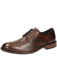 Scarpa da uomo in pelle marrone, con texture liscia, punta rotonda e design con laccio a cinque fori; presenta una suola in tono legno contrastante.