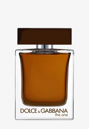 Flacon de parfum en verre clair avec un liquide marron et un bouchon rectangulaire marron foncé, étiqueté Dolce & Gabbana The One.