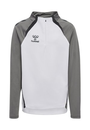 Camisa atlética de manga larga en blanco con mangas raglán grises; presenta un cuello con media cremallera y un logo negro en la parte superior izquierda del pecho.