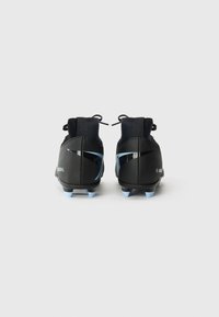 Pair of black soccer cleats with light blue soles and accents, viewed from the back on a plain white background.