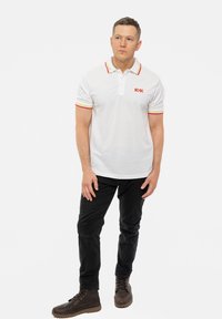 Paradiso Clothing AC/DC VOLTAGE LOGO - Polo shirt - white