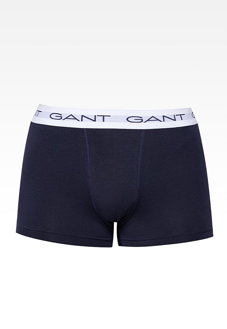 Marineblaue Herren-Boxerbriefs mit weißem elastischem Bund, der wiederholt das "GANT"-Logo zeigt, aus glattem Stoff und mit sichtbaren vorderen Nähten.